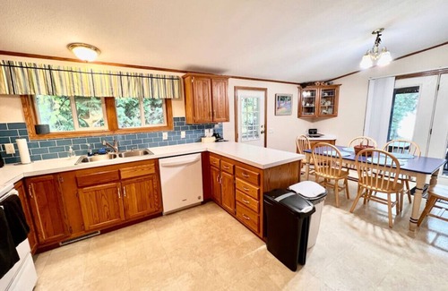 Rowleys Bay House | Twin Peaks- Private Beach at Sand Bay