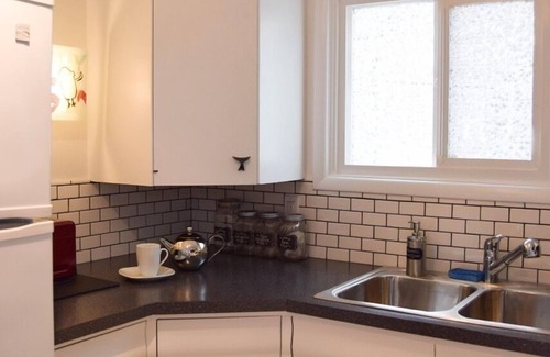 North End Cottage | Two Bedroom Cottage In the Heart of Proctor Neighborhood