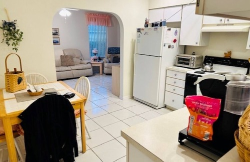 Bearss Plaza House | Two Bedroom fully furnished house, full kithcen; sleeps Eight