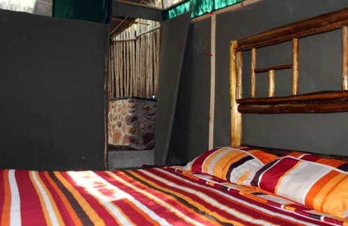 Thorny Bush Game Reserve Cabin | Two Bedroomed Bush-tent on the Klaserie River, with free lion / hyena sounds.