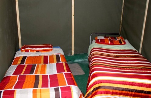 Thorny Bush Game Reserve Cabin | Two Bedroomed Bush-tent on the Klaserie River, with free lion / hyena sounds.