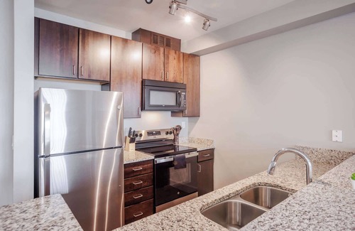 Central Business District Apartment | TWO CozySuites at the Banks 18