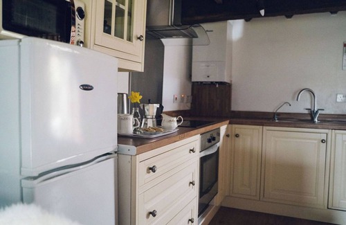 Beddgelert House | Ty Hebog: Cosy 17th Century Barn with Log Burner