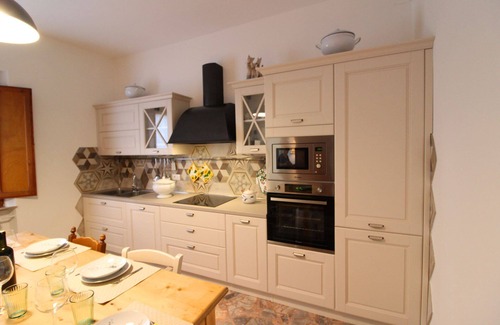 Le Piazze Villa | Typical Tuscan house with private and fenced swimming pool. View on the village of Castiglion Fioren