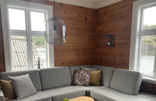 Bomlo House | Unique and charming holiday home with a rich sea house right on the seafront.