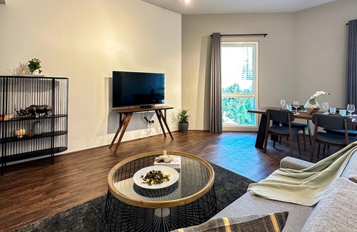 Barsha Heights Apartment | Unique Curvy Retreat, Perfect For Romantic Getaway