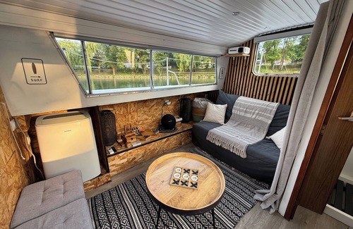 La Ferte-sous-Jouarre Boat Rental | 🌿 Unusual overnight stay aboard Le Viking - Disconnecting on the Marne River