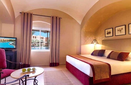 Makadi Bay Resort | Unwind in a Comfortable Room with Pool and Easy Beach Access Nearby