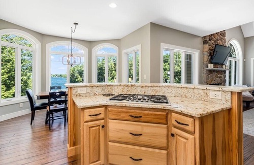 Lochmere House | Unwind in Waterfront Luxury: Custom Home in a Peaceful Cove