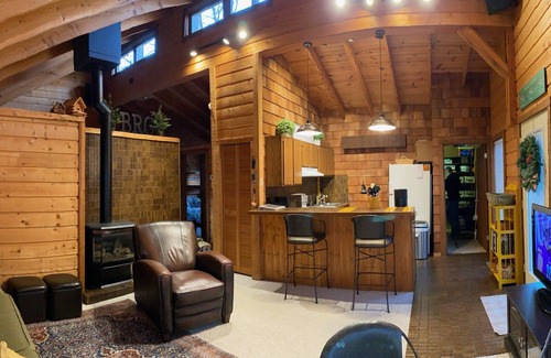 Thompsonville House | Up-north wood cabin, steps from river, 1 mile to Crystal Mtn Resort, free wifi.