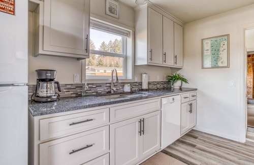 Bay City House | Updated Bay City Home Has Sunny Great Room, Fenced Yard, Deck, and Game Room!