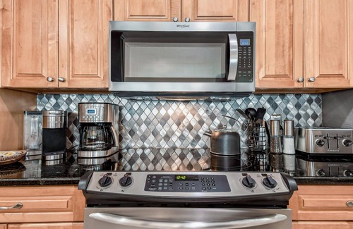 Clearwater Beach Condo | Updated - Dolphins - MOM Clean - Waterfront- Lux 4 Bedroom/3 Bath (Unit #203)