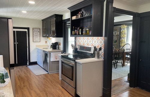 Hartwick House | Updated historic home with barn, great views, and EV charger for electric cars!