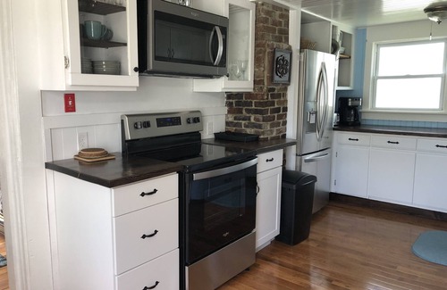 Weirs Beach House | Updated Quaint Cottage Steps to Weirs Beach Boardwalk, Eats & Fun!