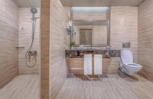 Ras Umm Sid Hotel | Upscale Adults-Only Beachfront Retreat w/Spa, Pools l 4 Partial Sea-view Rooms