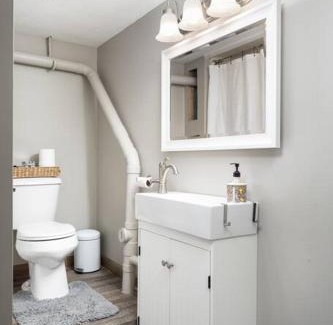 Traverse City House | Upscale Urban Oasis: Spacious & Chic with Hot Tub!
