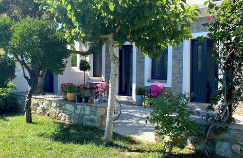 Karystos House | Urban Oasis: Stone House with pool & garden