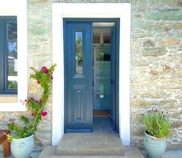 Karystos House | Urban Oasis: Stone House with pool & garden