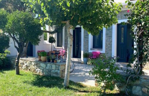 Karystos House | Urban Oasis: Stone House with pool & garden