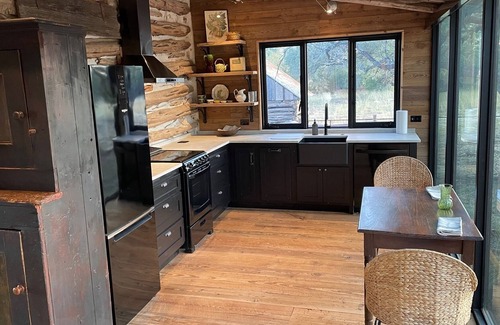 Kendall County Cabin | 1846 Secluded, Restored Cabin on 40 acres with Modern Finishes