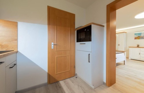 Warnemuende Apartment | Vacation apartment "Luv" with terrace, parking on the property