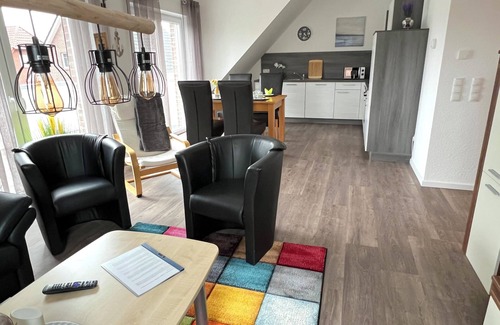 Papenburg Apartment | Vacation apartment "Aurora" Papenburg Large balcony EBK New building 74 sqm Free Wifi 2 bedrooms