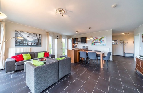 Schillig Apartment | Vacation apartment by the North Sea with a great balcony by the water and its own sauna