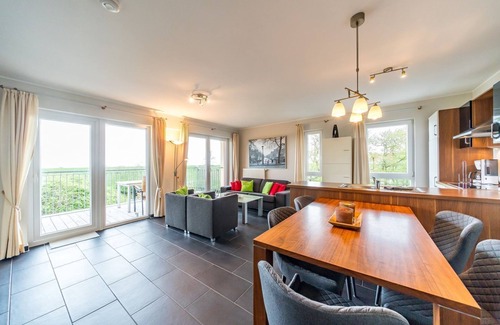 Schillig Apartment | Vacation apartment by the North Sea with a great balcony by the water and its own sauna