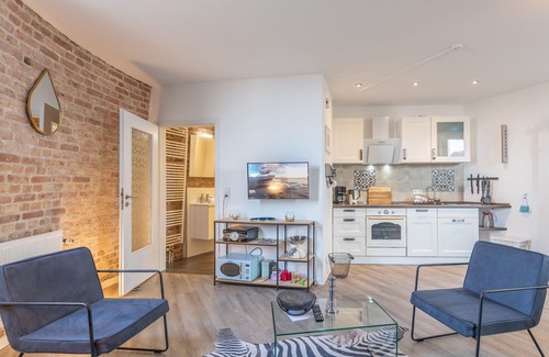 Zentrum Apartment | Vacation apartment Husumer Wasserturm - Apartment 1 in Husum for up to 3 people