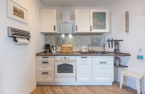 Zentrum Apartment | Vacation apartment Husumer Wasserturm - Apartment 1 in Husum for up to 3 people