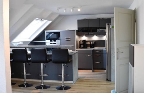 Langeoog Apartment | Vacation apartment -JAKOB- in the vacation domicile "PaPaJa" on the upper floor with a large roof terrace.