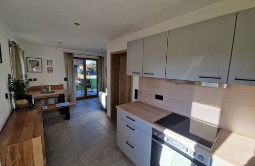 Aschau im Chiemgau Apartment | Vacation home Bauernhofchalet - living on two floors with south-facing terrace and garden