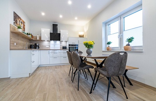 Walchum House | Vacation home for 6 guests with sauna, fireplace and lake view in Walchum