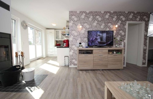 Pelzerhaken House | Vacation home near the beach for 6 people and dog with fireplace & garden in a quiet location.