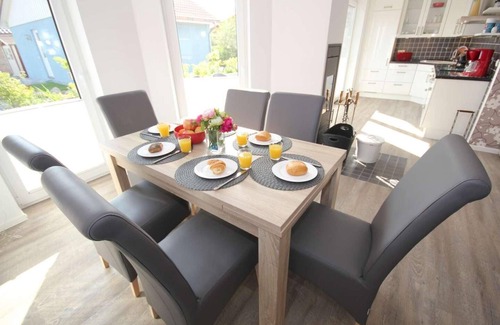 Pelzerhaken House | Vacation home near the beach for 6 people and dog with fireplace & garden in a quiet location.