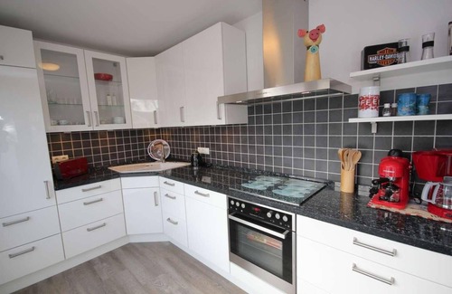 Pelzerhaken House | Vacation home near the beach for 6 people and dog with fireplace & garden in a quiet location.