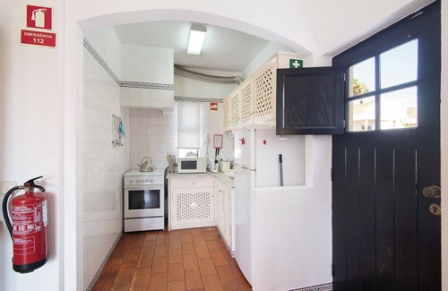Conceicao e Cabanas de Tavira House | Vacation Home 'Quinta Velha Village 134" with Balcony, Shared Pool & A/C