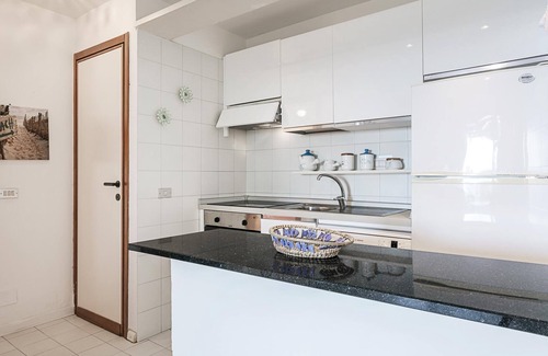 Portisco House | Vacation Home Rena Bianca Flat with Sea View, Terrace & Garden
