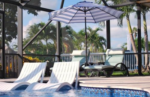 Tropic Palms House | VacationSunwind Delray home! Water Front Pool Dock near Beach