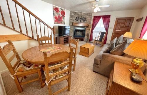 Red River House | Valley Condo 101 Creekside - End Unit - Wi-Fi - Hot Tub - Fireplace - Washer - Dryer - Playground