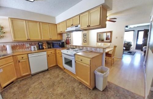 Red River House | Valley Condo 126 - Creekside - WiFi - Hot Tub - Fireplace - Washer - Dryer - Playground