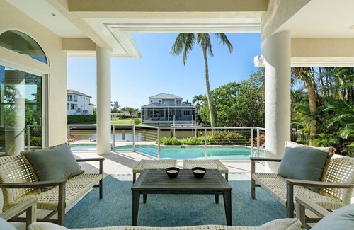 Naples Park Apartment | Vanderbilt Queen - Coastal Retreat w/Pool & Dock - 5 min to Vanderbilt Beach