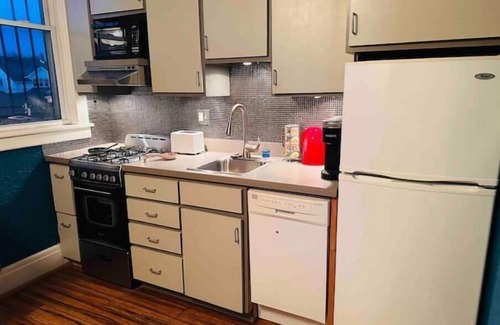 North Buffalo Apartment | Vaulted Loft in Historic Bank on Hertel King Bed + walk to shops