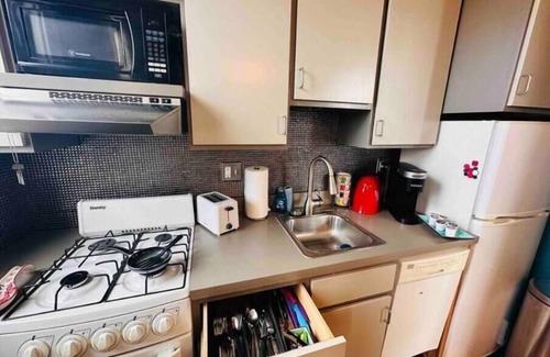 North Buffalo Apartment | Vaulted Loft in Historic Bank on Hertel King Bed + walk to shops