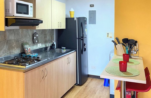 La America Apartment | Vibrant and colorful: energy and comfort for two