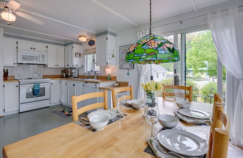 Tawas City Cottage | Vibrant Waterfront Vacation Rental on Lake Huron!