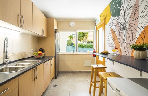 Quarteira Villa | Vilamoura: Retreat with Heatable Pool & BBQ