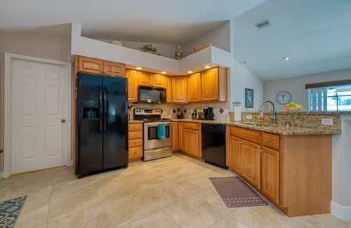 Caloosahatchee Villa | VILLA BOATERS DREAM – HEATED POOL & SPA | GULF ACCESS | BOAT RENTAL + TOURS VOUCHER INCL.