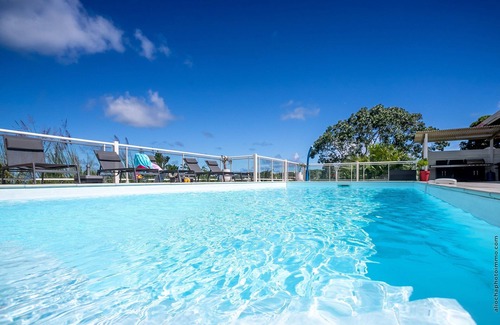 Le Vauclin House | Villa Cacyli: private heated pool and Jacuzzi, view of Baie des Mulets