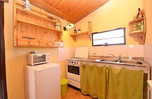 Viagrande House | Villa Carlina B: A graceful apartment surrounded by the greenery.